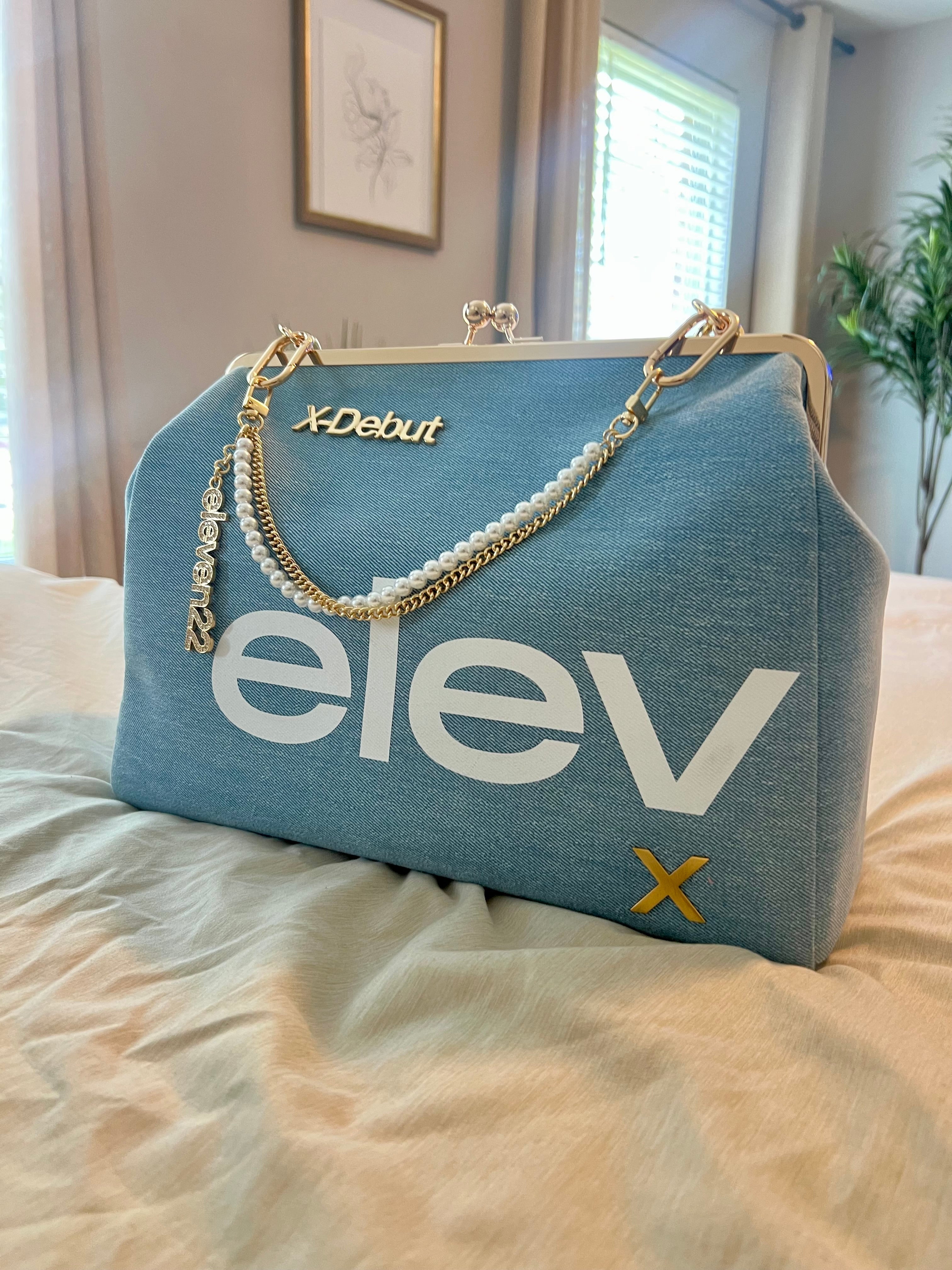 Signature Kiss Lock Jumbo Clutch in denim blue with pearl and gold chain handle